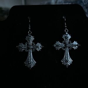 Gun mental rhinestone cross earrings.